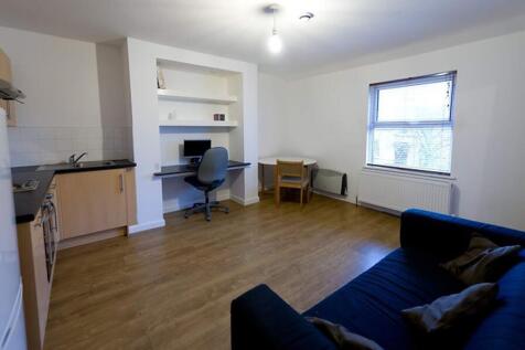 This inviting living room features a cozy seati...
