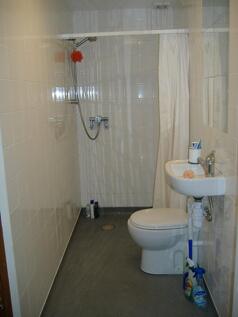 This well-maintained bathroom features a clean ...