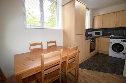 This well-appointed kitchen features modern app...