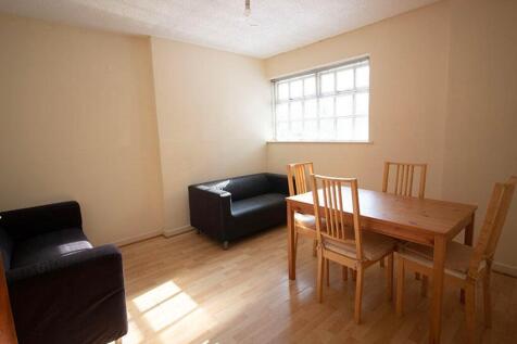 Bright and inviting living room featuring a coz...
