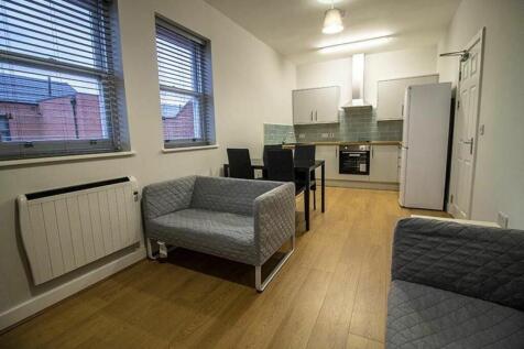 A modern and inviting living room space featuri...