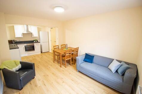 Spacious and inviting living room featuring a c...