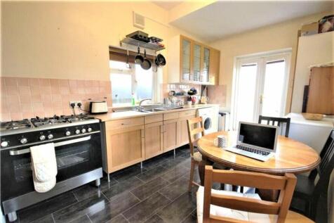 A bright and functional kitchen featuring moder...