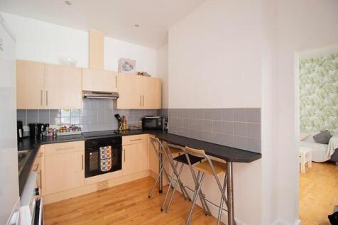 This stylish kitchen features modern appliances...