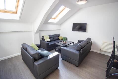 A stylish living room featuring modern furnishi...
