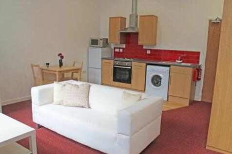 This inviting kitchen features modern appliance...