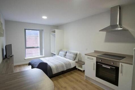 A bright and inviting double bedroom featuring ...