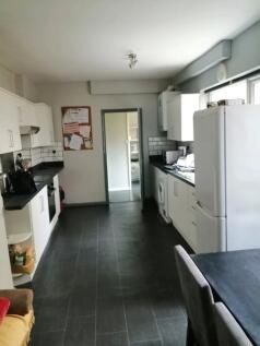 Modern kitchen with ample storage and workspace...