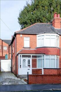 Charming red-brick exterior featuring a spaciou...