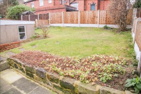 A charming garden space featuring a well-mainta...