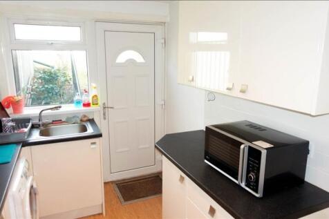 This well-maintained kitchen features modern ca...