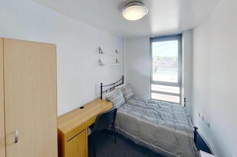 Bright and inviting double bedroom featuring a ...