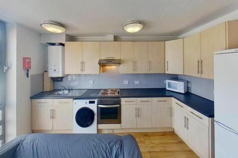 This well-appointed kitchen features modern app...