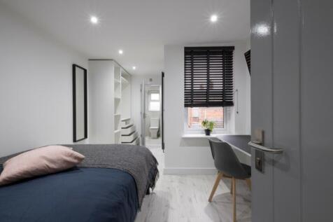 A beautifully designed double bedroom featuring...