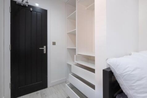 A clean and tidy small storage area, perfect fo...