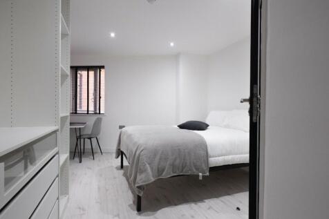 Bright and inviting double bedroom featuring a ...