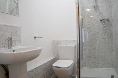 A modern and clean bathroom featuring a stylish...