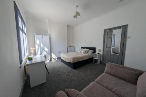 Bright and inviting double bedroom featuring a ...