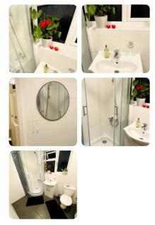 A modern bathroom featuring a clean design, amp...