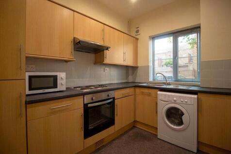 This well-appointed kitchen features modern app...