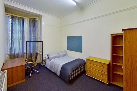 Spacious and inviting double bedroom featuring ...
