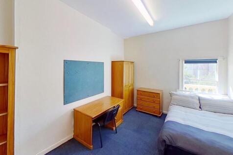 Bright and inviting double bedroom featuring a ...