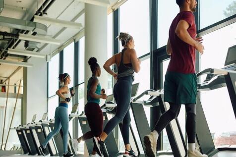 A bright and modern gym featuring state-of-the-...