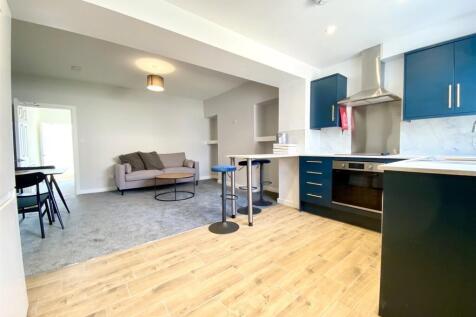 This spacious living room features modern décor...
