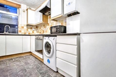 A modern and bright kitchenette featuring ample...