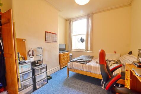 Bright and cozy double bedroom featuring large ...