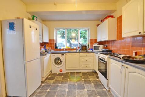 Bright and spacious kitchen featuring modern ap...