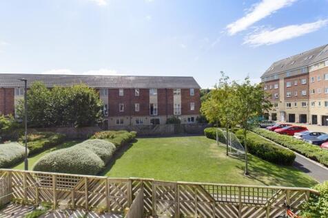 A bright and spacious communal garden area with...
