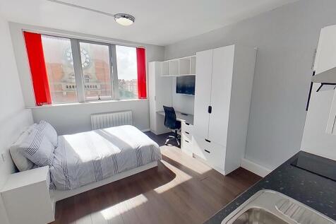 This charming double bedroom features ample nat...