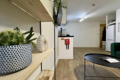 A bright and inviting living room with modern d...