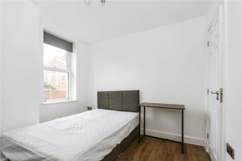 Bright and inviting double bedroom featuring a ...