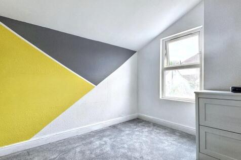 Bright and inviting double bedroom featuring a ...