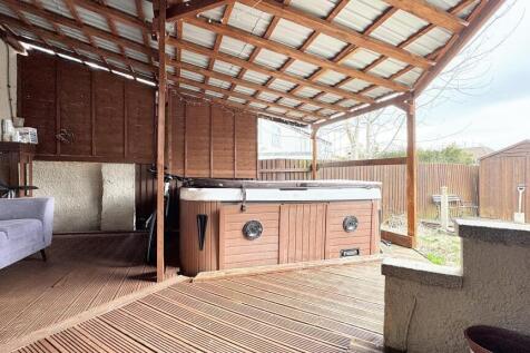Enjoy a serene outdoor retreat with a spacious ...