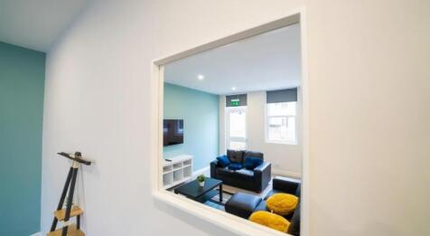 A modern living room featuring comfortable seat...