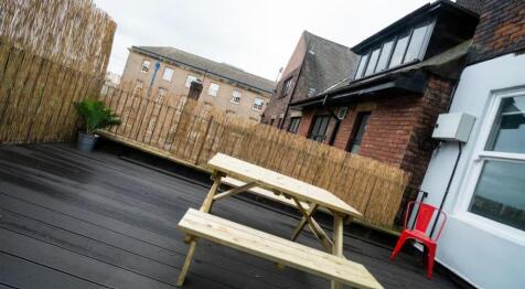 Enjoy a charming outdoor space perfect for rela...
