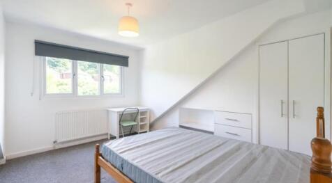 Bright and inviting double bedroom featuring a ...