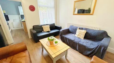 A cozy living room featuring comfortable seatin...