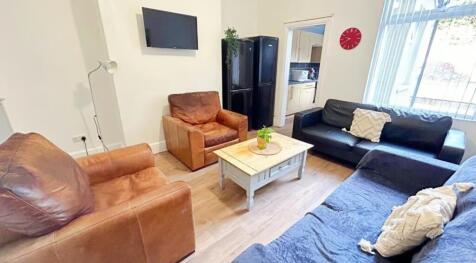 This inviting living room features comfortable ...