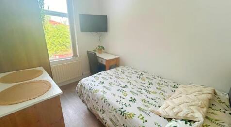 Bright and inviting double bedroom featuring a ...