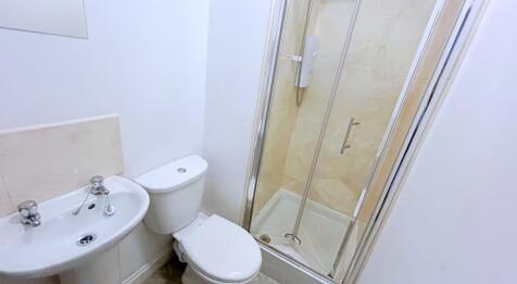 Modern and well-maintained bathroom featuring a...