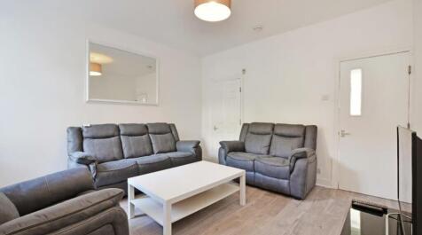 This inviting living room features comfortable ...