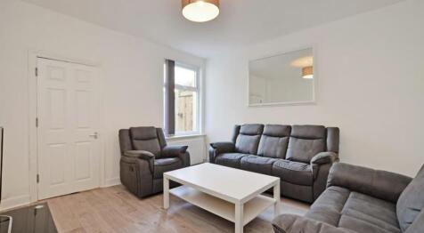 This inviting living room features comfortable ...