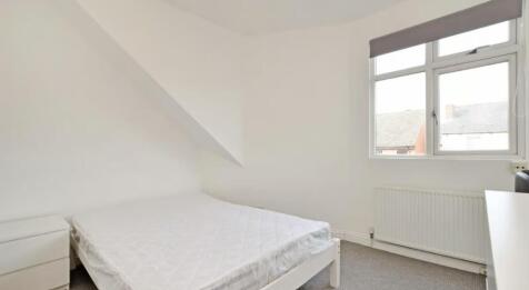 Bright and inviting double bedroom featuring a ...
