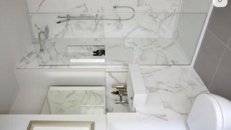 A beautifully designed bathroom featuring elega...