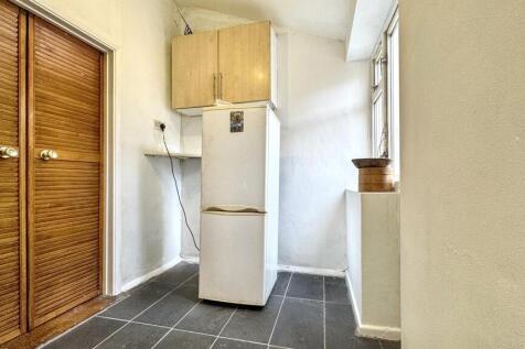 This well-maintained kitchen features ample sto...