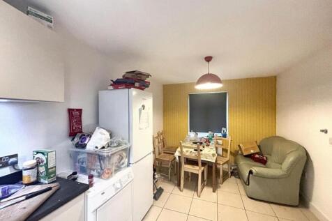 This inviting kitchen area features ample space...